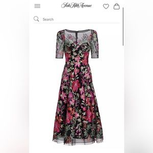 Brand new Teri Jon. Tags were removed but has never been worn!